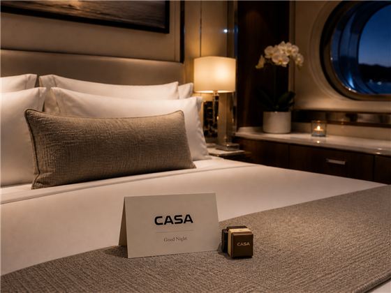 CASA turndown card and bed linen detail